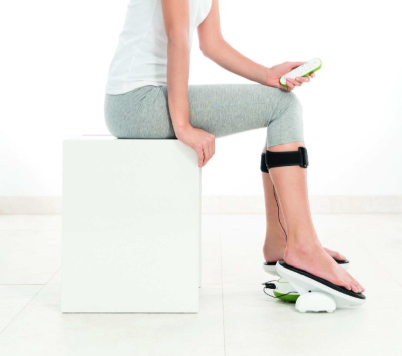 EMS devices provide relief by stimulating your muscles Beurer FM250 Vital Legs EMS Circulation Stimulator in Use
